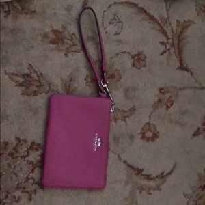 Pink coach wristlet